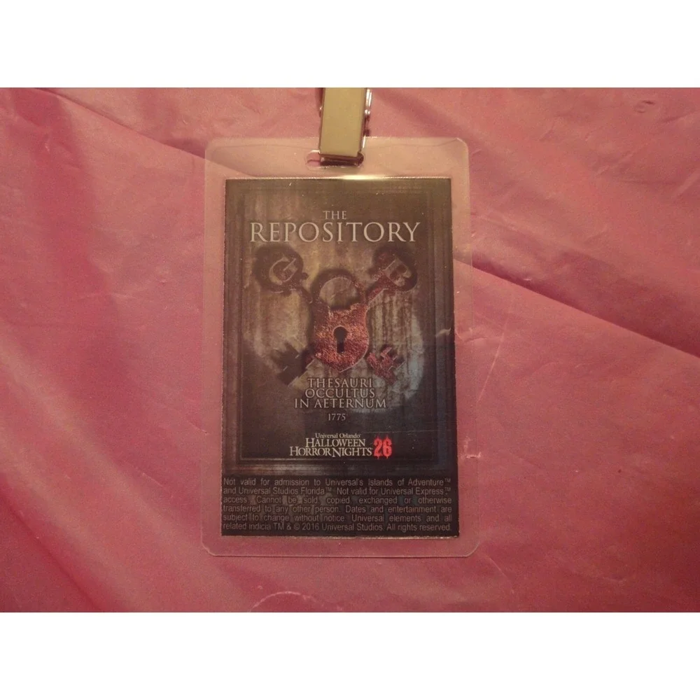 2016‎ HALLOWEEN HORROR NIGHTS 26 REPOSITORY ACCESS 3SW badge legendary orange